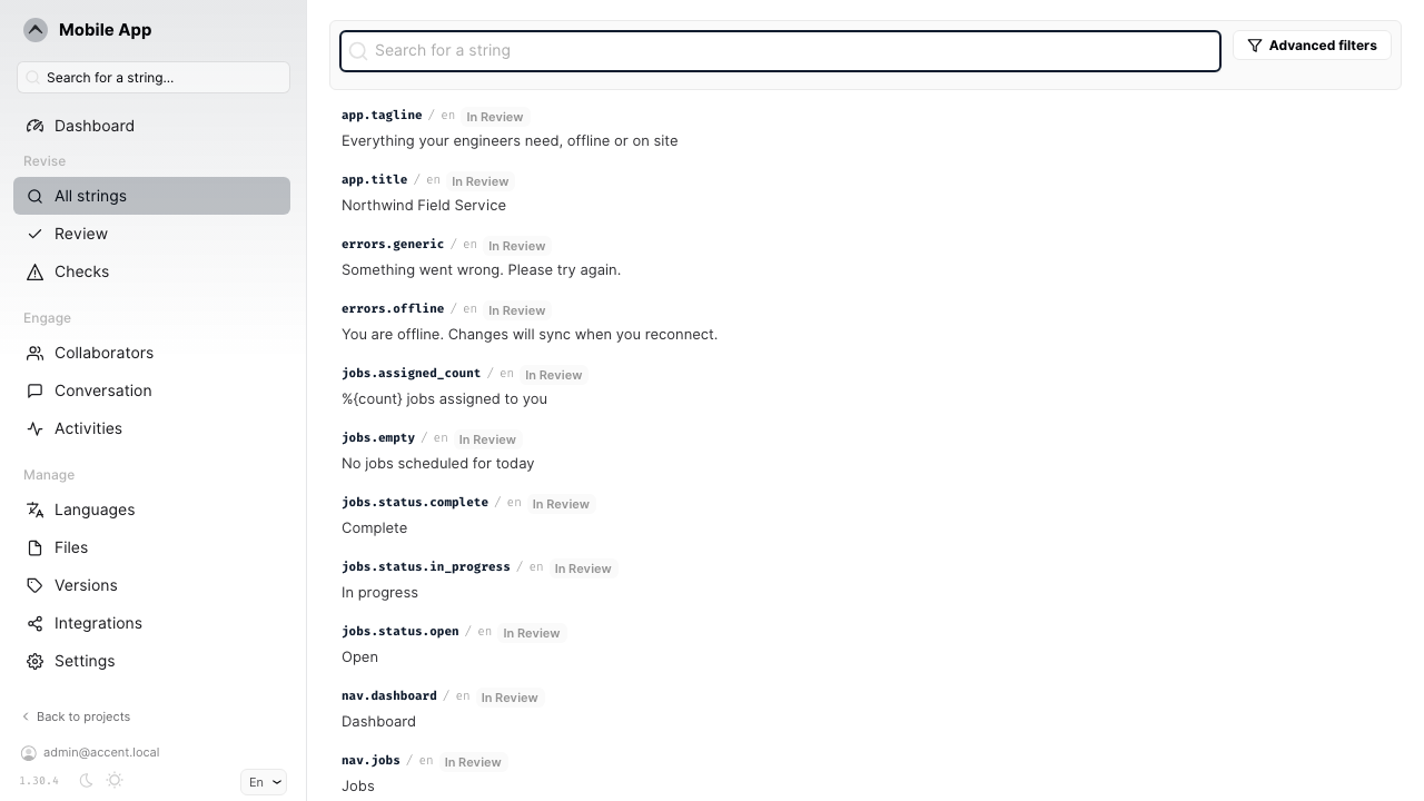 The Accent strings list for a project, showing real imported keys such as app.title and jobs.status.open alongside their English text and an In Review badge for each
