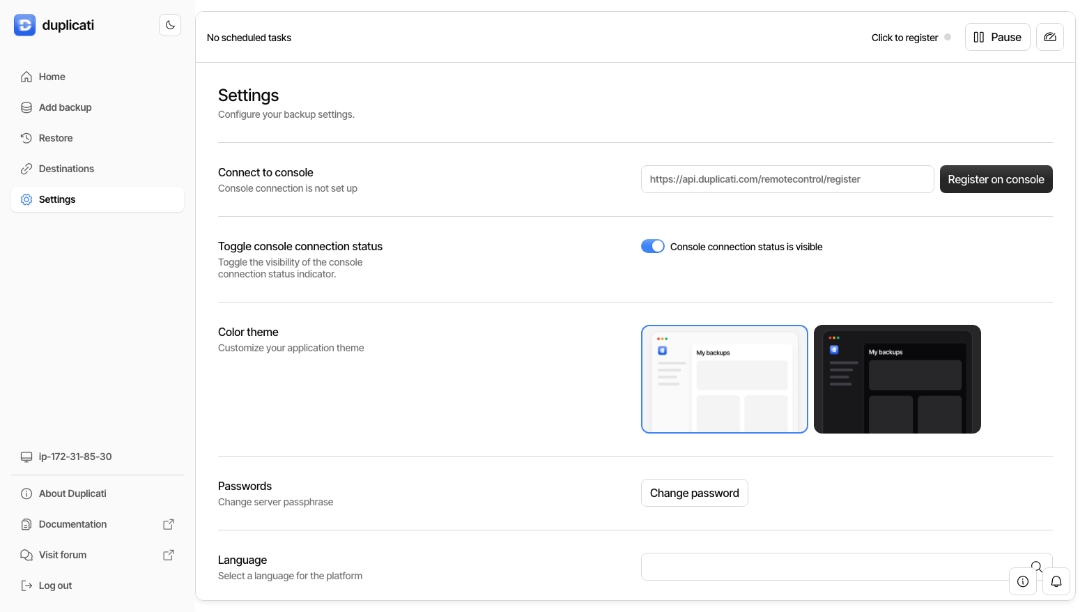 The Duplicati Settings screen with options to change the server passphrase, theme and language