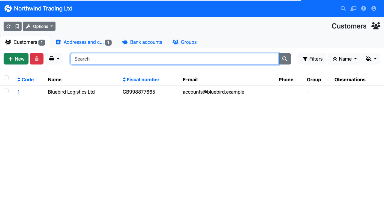The FacturaScripts customer list showing the newly saved customer with its code, tax number and email address
