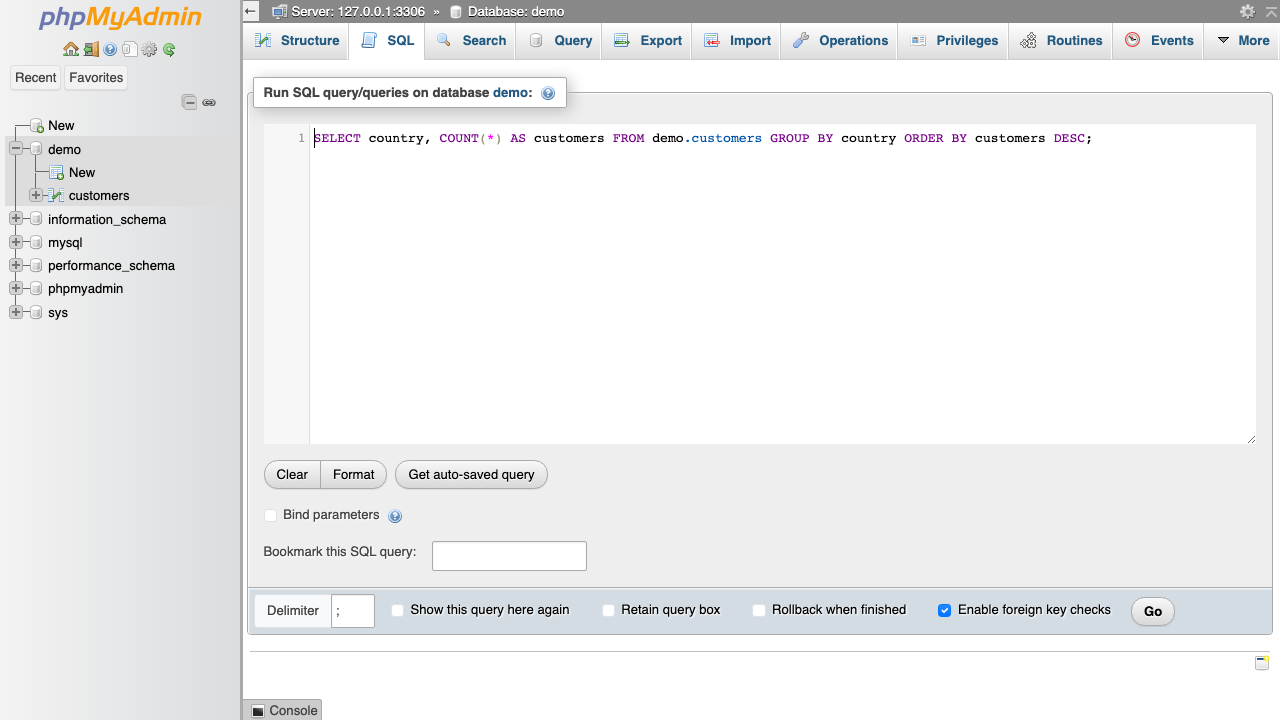 The phpMyAdmin SQL query tab with a sample GROUP BY query entered