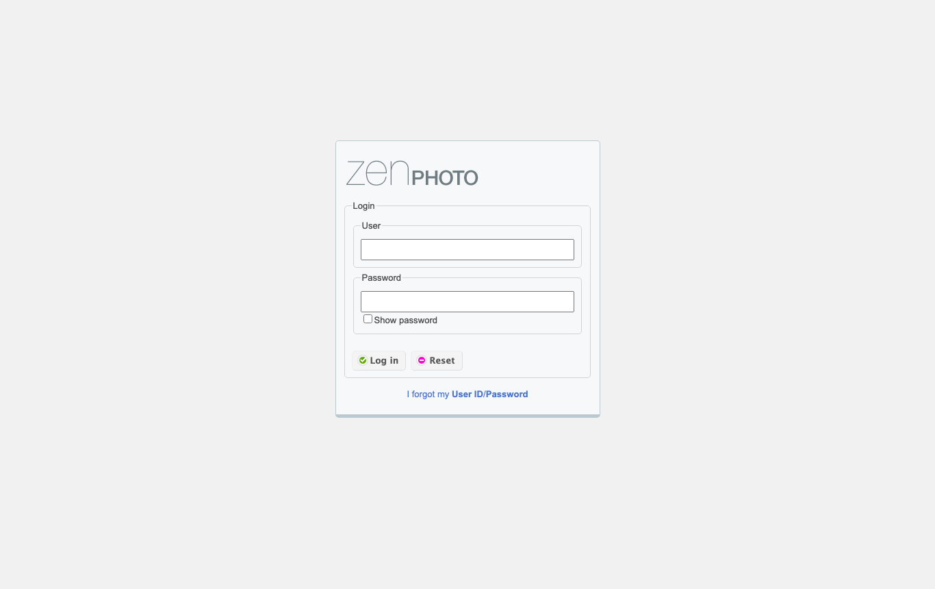 The Zenphoto backend sign in form with User and Password fields, Log in and Reset buttons and an I forgot my User ID/Password link